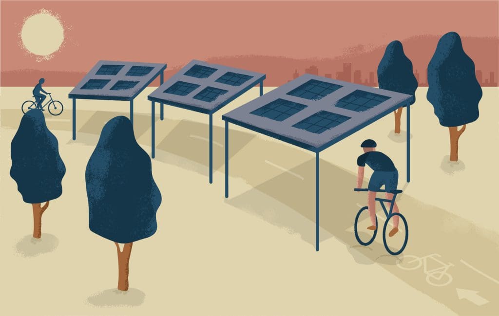 Solar panels raised above a cycling track