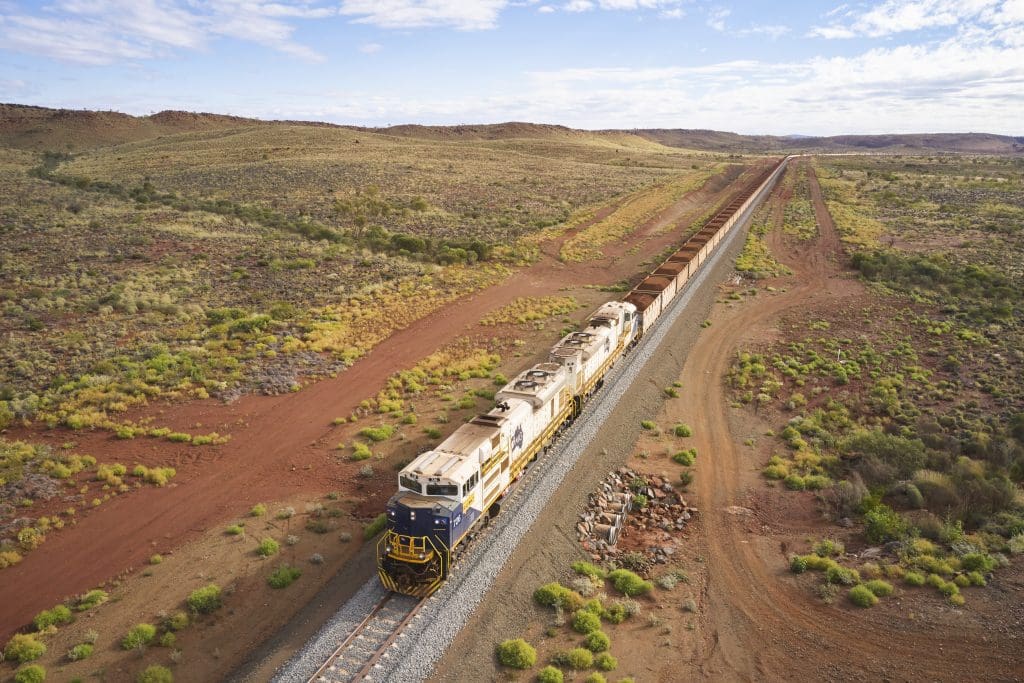This Aussie mining giant says it'll get to net zero by 2030 — without carbon credits 2 A freight train carrying mined goods in Australia