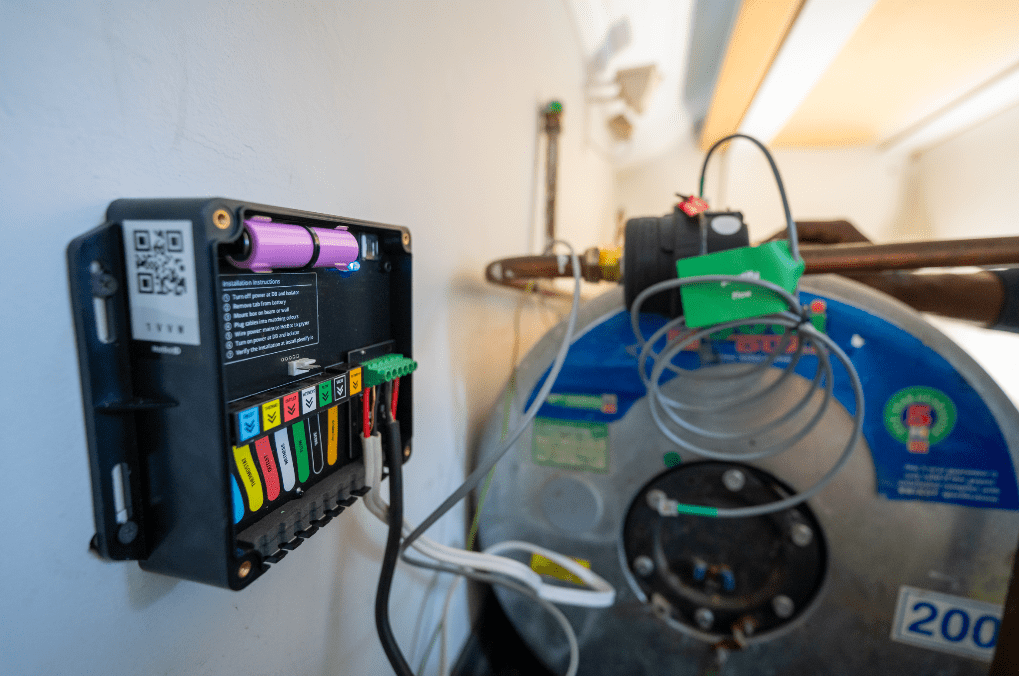 A water heater fitted with a HotBot to create a smart appliance