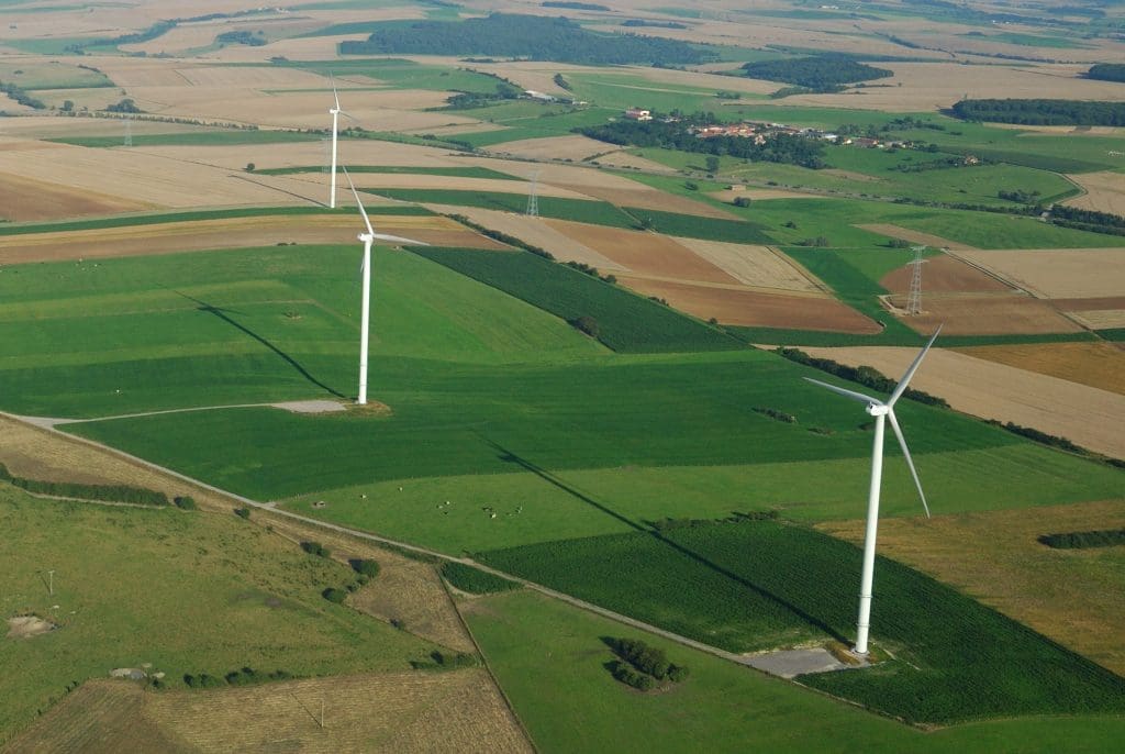 An aerial view of a wind farm producing renewable energy