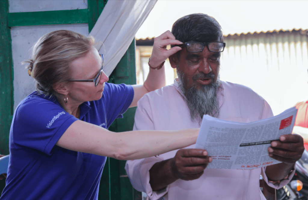“Watershed moment” in mission to get glasses to the 1 billion in need 4 A man tries a pair of reading glasses in Bangladesh.