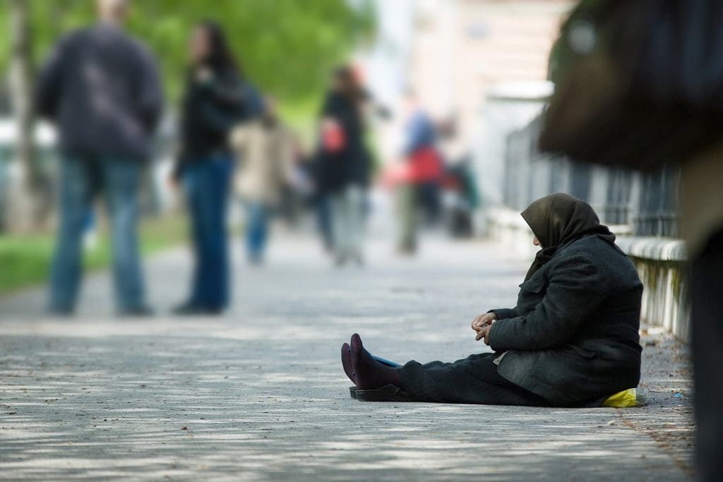 A homeless person in Europe, which has reduced poverty and inequality in recent years.
