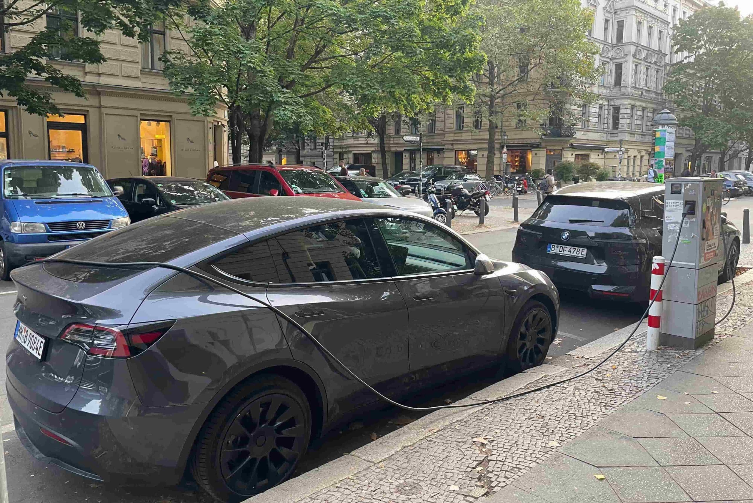 A photo of an electric vehicle at a charging stations. Once its battery reaches its end of life, it will be able to be recycled.