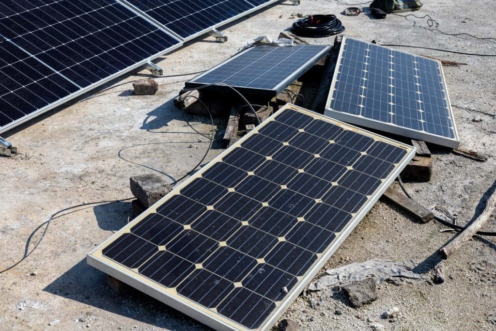 A photo of old solar panels, which will be reused.