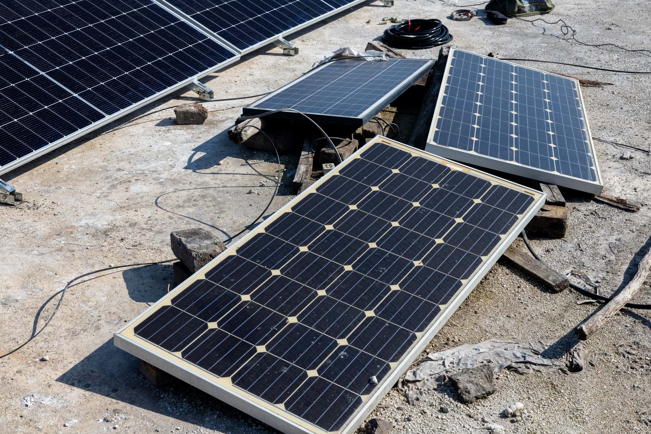 A photo of old solar panels, which will be reused.