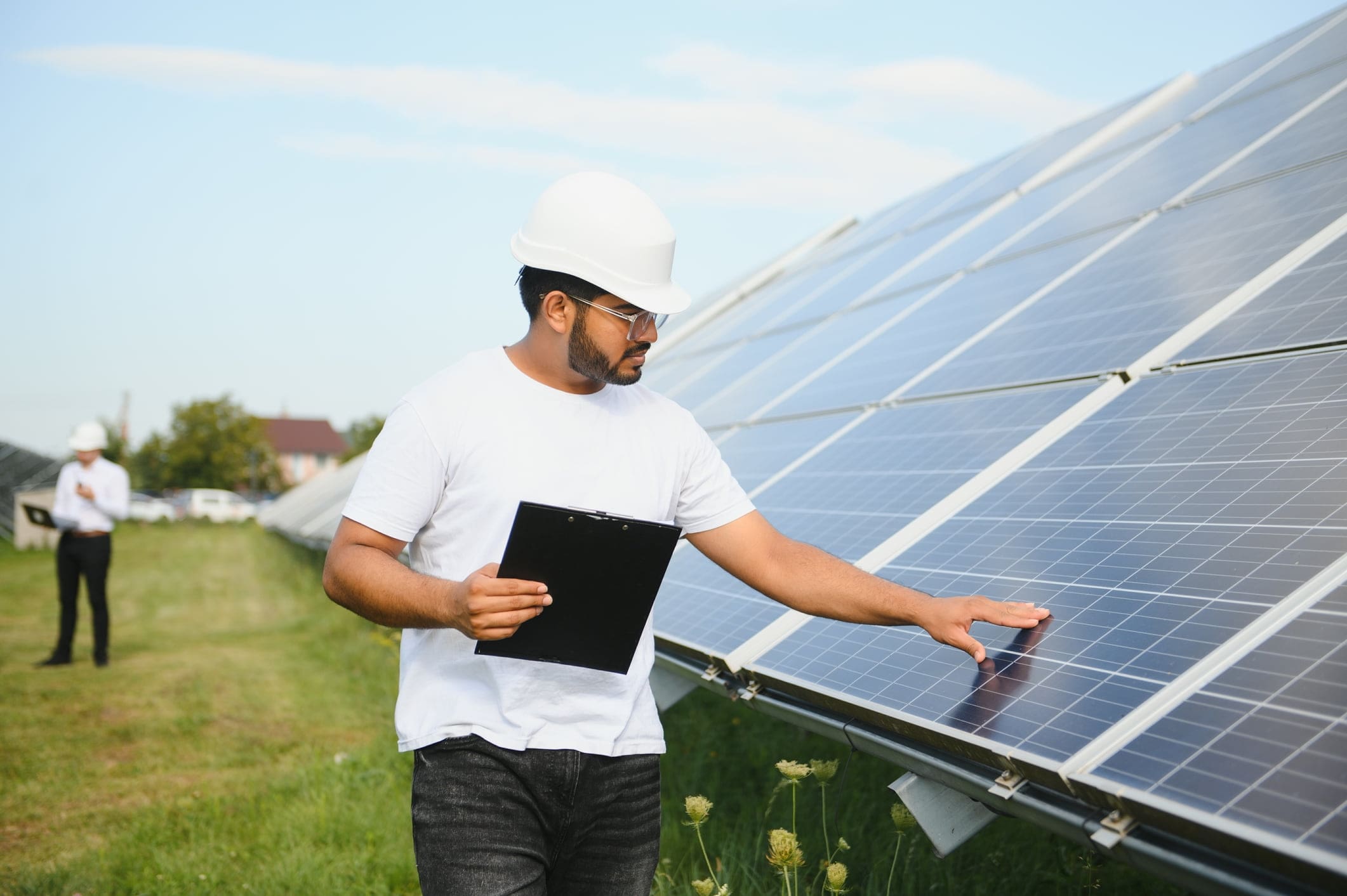 A photo of a solar energy professional in India.