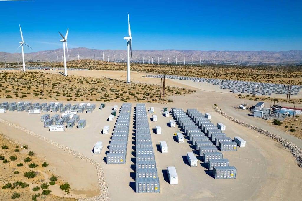 How China became the world’s leading market for energy storage 1 A photo of a battery energy storage system in China, alongside a wind farm.