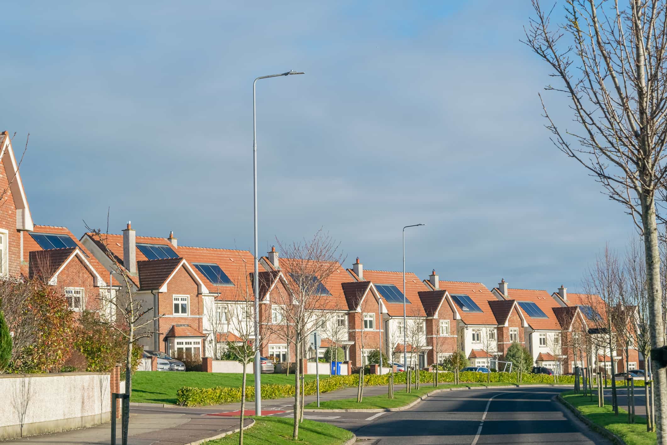 Houses in Ireland with solar panels on their roofs.
