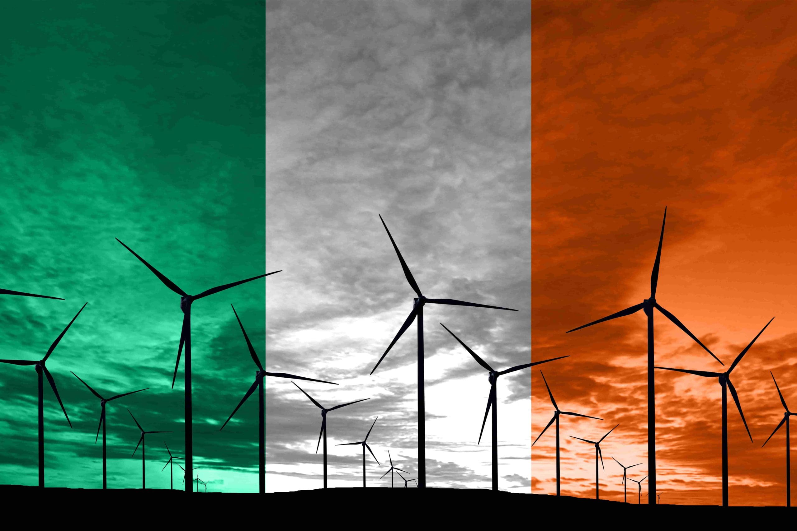 A photo of a wind farm with Ireland's flag overlaid.