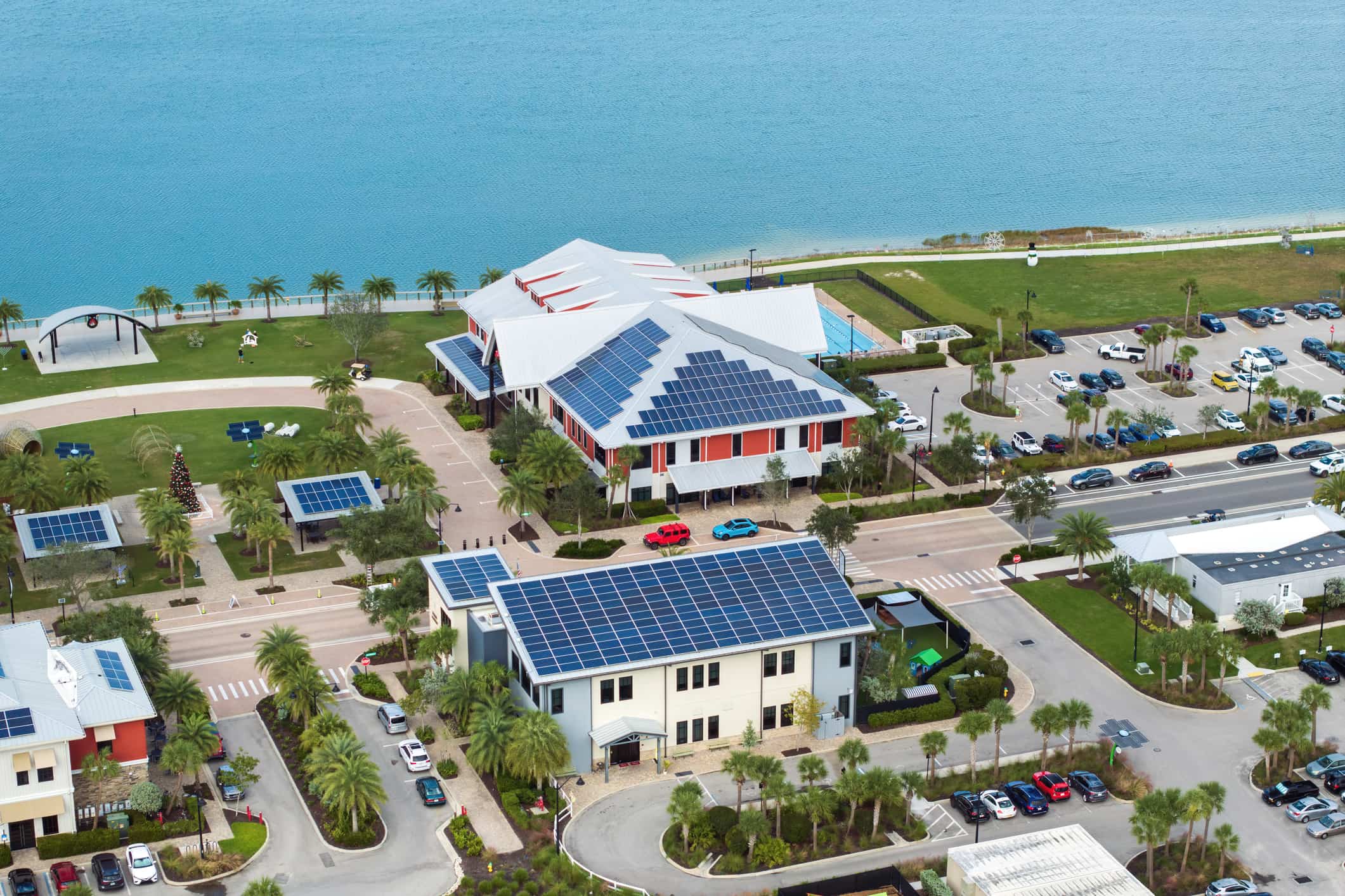 A photo of solar panels on roofs in Florida.